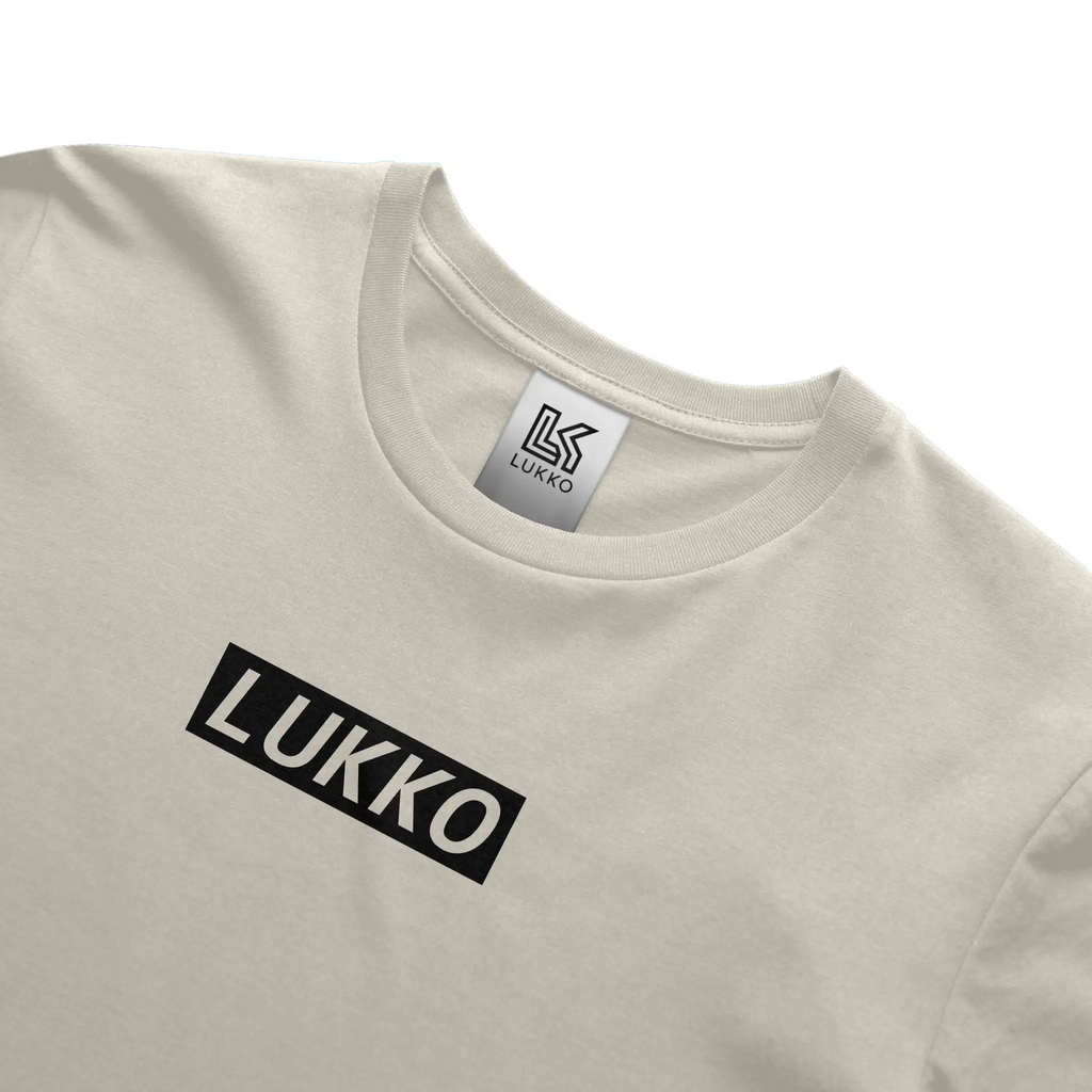 Apliiq Lukko Frame classic coupe T-shirt displayed flat, featuring the stylish graphic design on a black cotton tee.