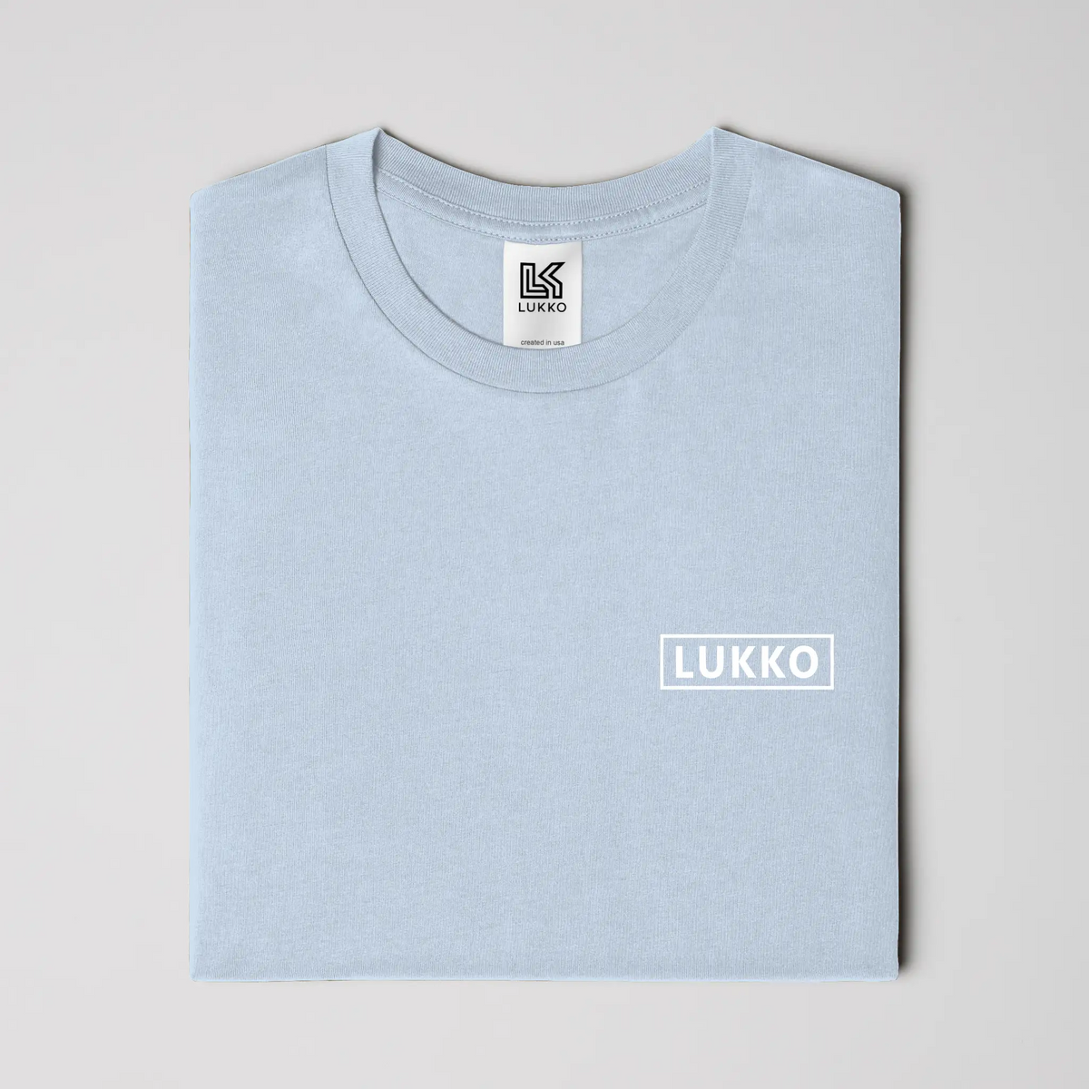 Apliiq Lukko Box classic fit T-shirt in black, featuring a simple crew neck and short sleeves, laid flat on a white background.